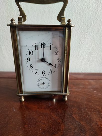Pendulette de voyage 
Vers 1900
H : 14 cm...