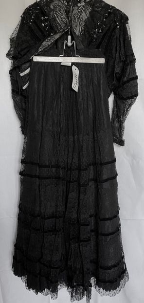 A Black silk and tulle ensemble with black...
