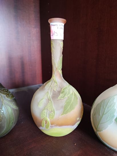 Dans le gout de Gallé. Quatre vases soliflores....