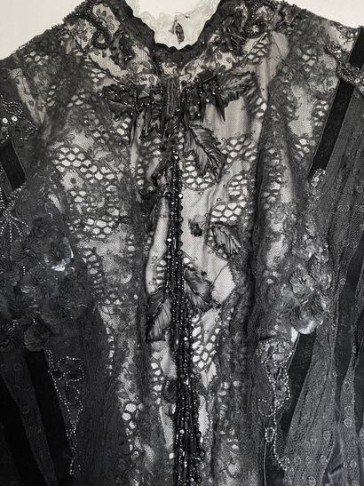 A Black silk and tulle ensemble with black...