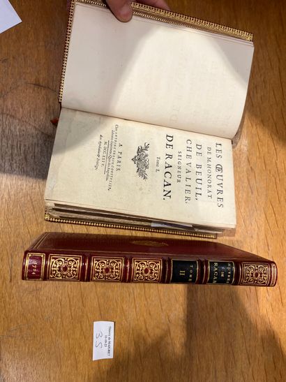 Two volumes of Racan with arms.