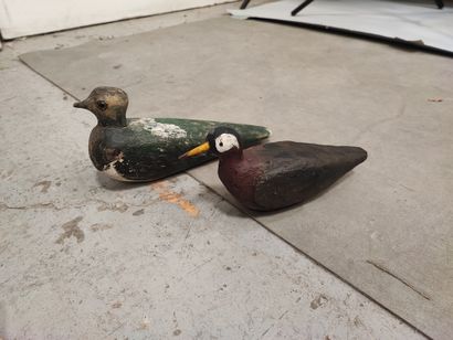 Two decoys including a polychrome wooden...