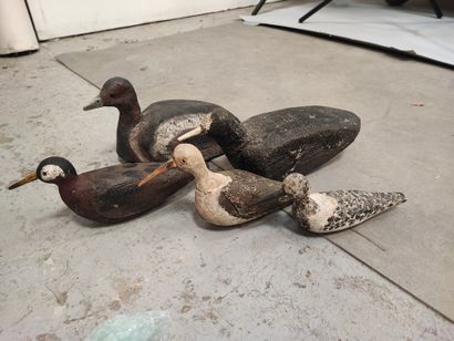 Set of five painted wood or cork decoys,...