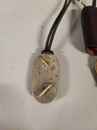 Two brass and nickel silver game counters....