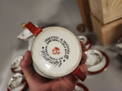 Porcelain coffee service with venery decor....