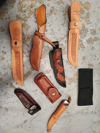Set of eight knife sheaths in leather and...