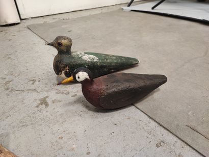 Two decoys including a polychrome wooden...