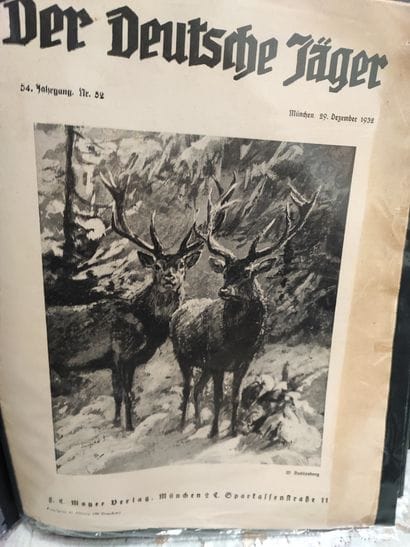 Set of two binders, one containing 17 magazines,...