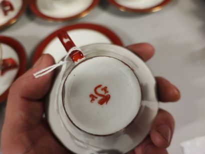 Porcelain coffee service with venery decor....