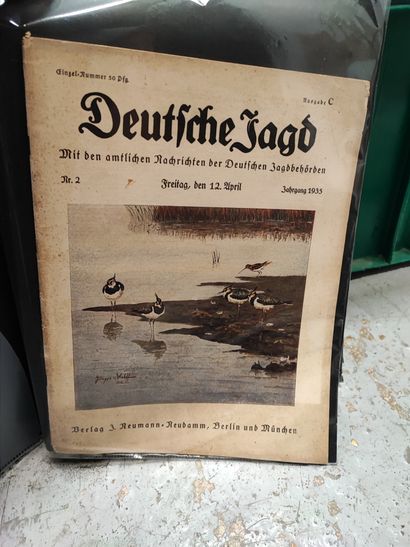 Set of two binders, one containing 17 magazines,...
