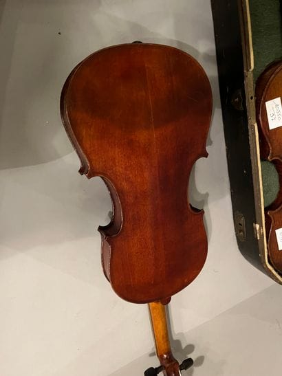 2 violins, one in its case with archer, 1...