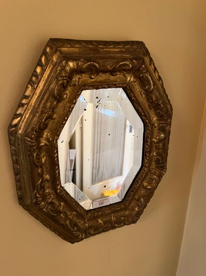 Gilded wood gabled mirror with foliate decoration
Circa...