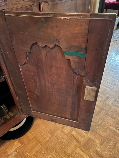 Carved fruitwood sideboard with three leaves...