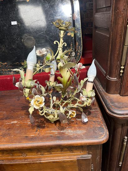 Two chandeliers decorated with pendants and...