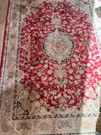 Red carpet with central medallion decorated...
