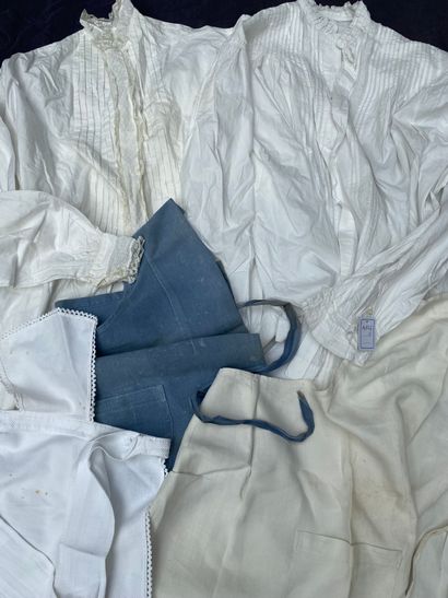 Large lot of white or blue aprons, blouses...