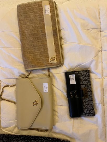 A wallet, a beige leather clutch bag and...