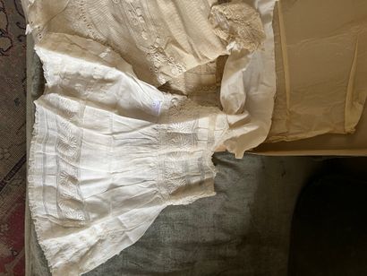 Set with little dresses including a christening...