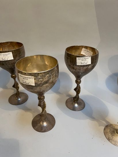 Six silver-plated stemmed glasses with hammered...