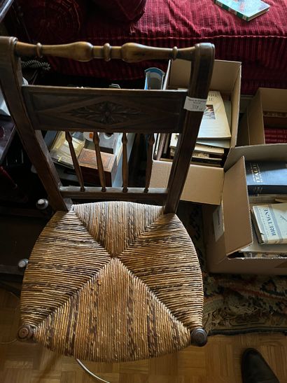 Six chairs with inverted backs, carved with...