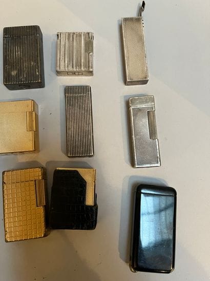 Lot of ten Dupont lighters in gilded or silvered...
