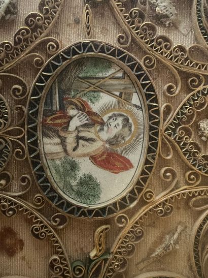 Small paperolles reliquary including Saint...