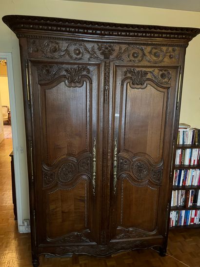Norman cabinet with carved decoration of...