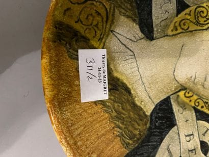 Set of two ceramic plates decorated with...