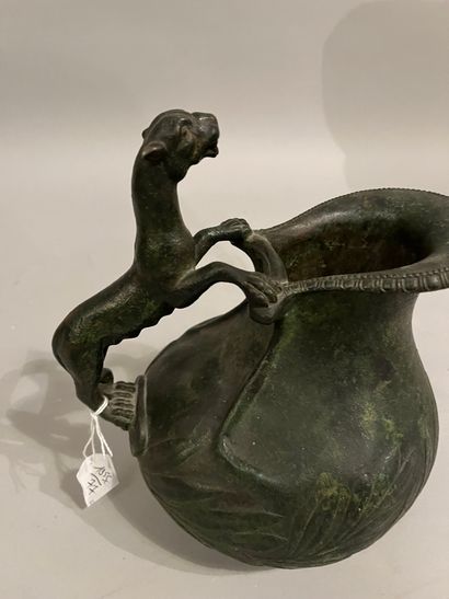 Bronze coffee pot depicting a panther in...