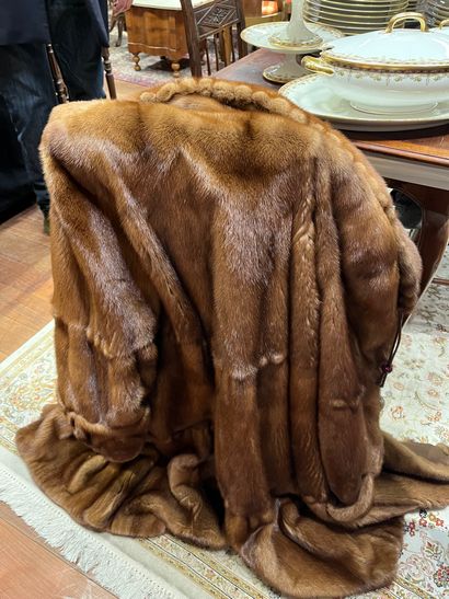 A coat (worn) Roger Gerko