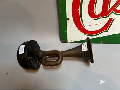 An enameled Castrol oil advertising plate...