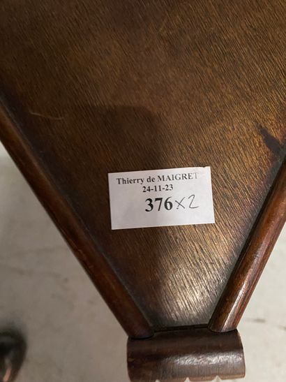 Small corner table in natural wood with two...