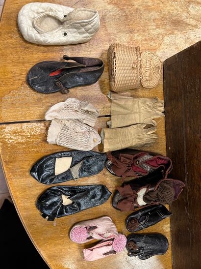 Set of doll clothes in wooden trunk, two...