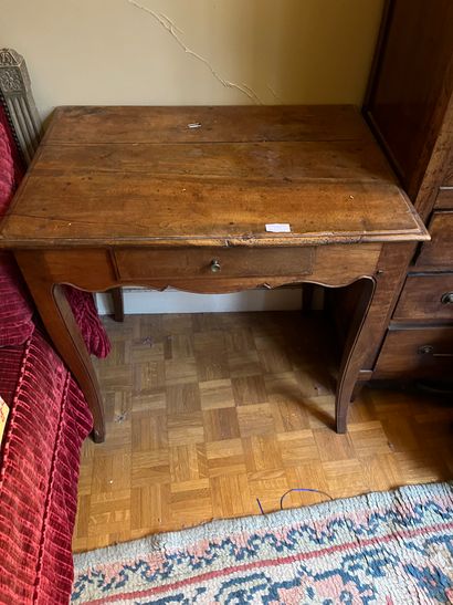 Set including a bibus, a writing table and...