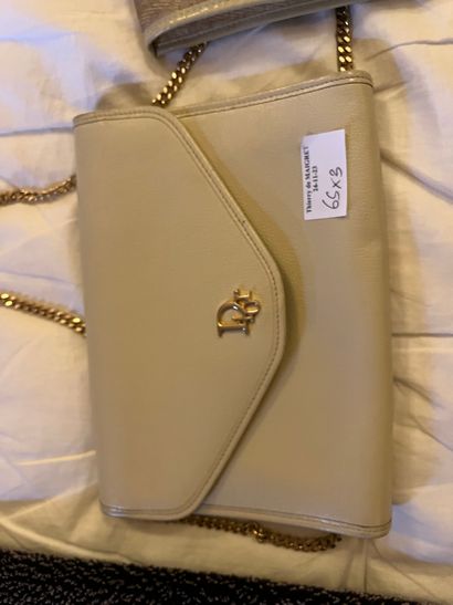 A wallet, a beige leather clutch bag and...