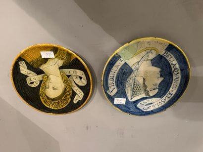 Set of two ceramic plates decorated with...