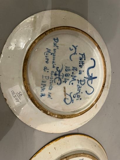 Set of two ceramic plates decorated with...