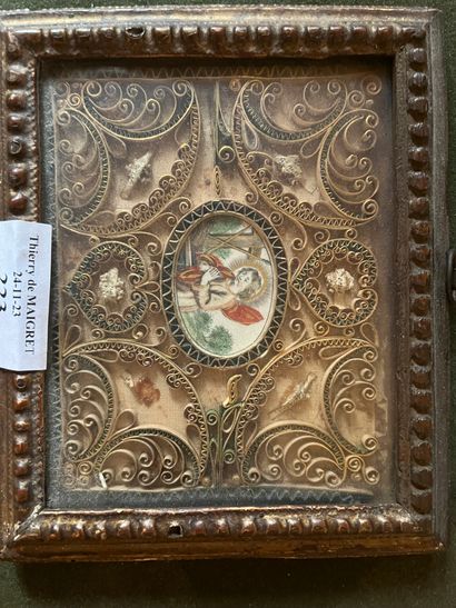 Small paperolles reliquary including Saint...