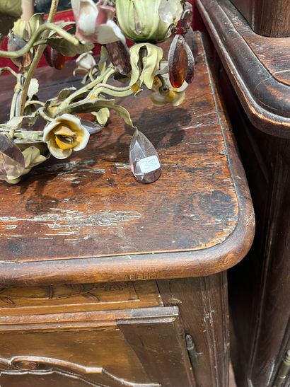 Two chandeliers decorated with pendants and...