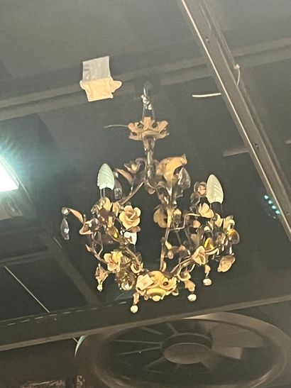 Two chandeliers decorated with pendants and...