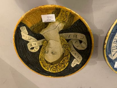 Set of two ceramic plates decorated with...