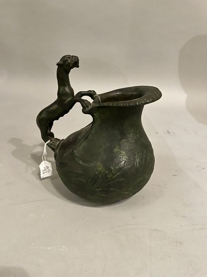 Bronze coffee pot depicting a panther in...