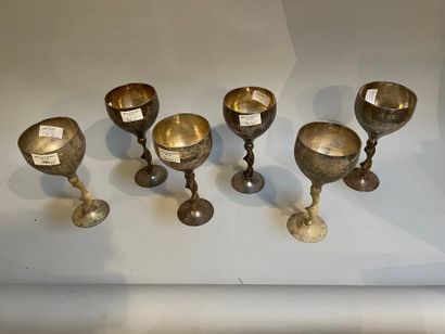 Six silver-plated stemmed glasses with hammered...