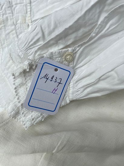 Large lot of white or blue aprons, blouses...