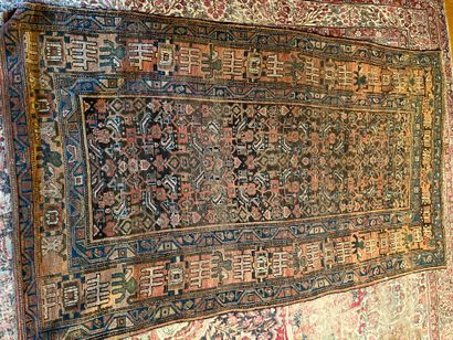 Persian rug with orange background and geometric...