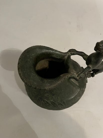 Bronze coffee pot depicting a panther in...