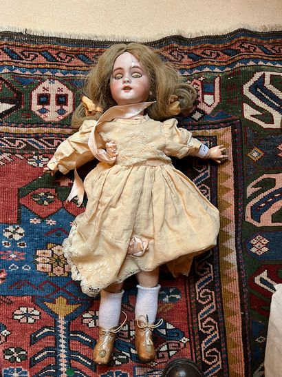 Doll
Bisque head, open mouth, movable eyes,...