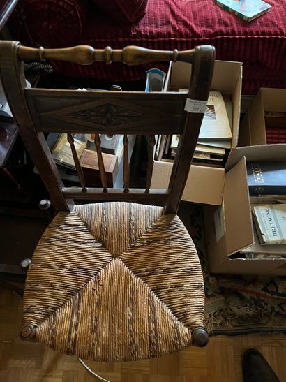 Six chairs with inverted backs, carved with...