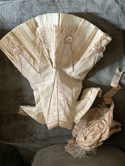 Set of doll clothes in wooden trunk, two...