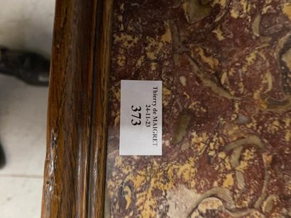 Turned wood stool joined by a spacer.
Upholstered...